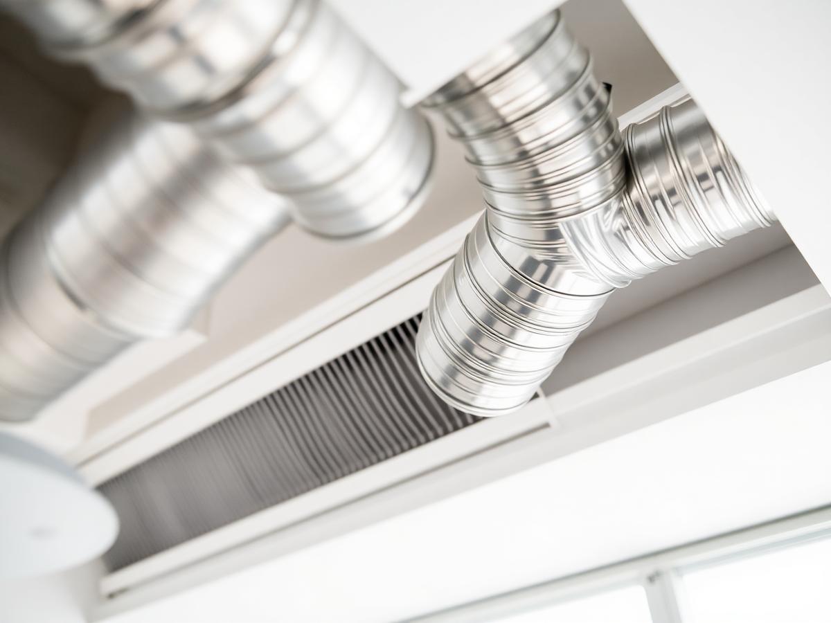 Clean sheet-metal air ducts in a home